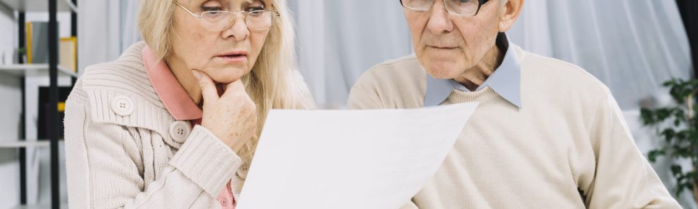 senior-couple-doing-paperwork